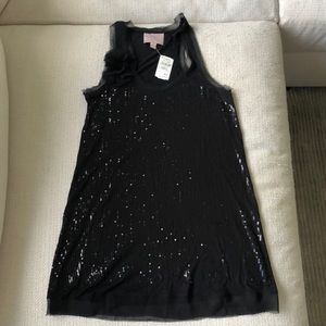 Black sequined Romeo and Juliet tank with flowers